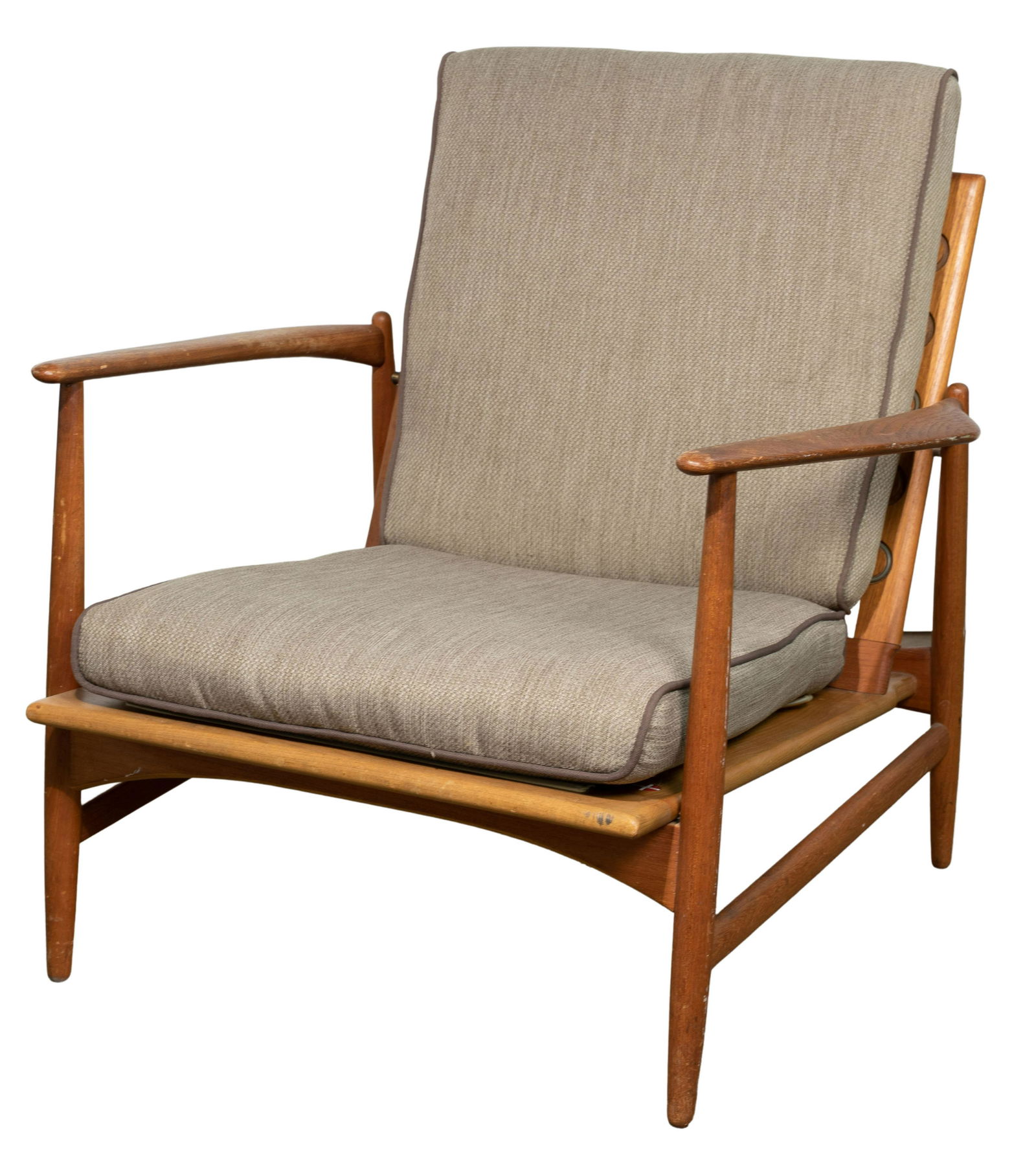 MCM Ib Kofod-Larsen for Selig Danish Chair: MCM Ib Kofod-Larsen for Selig Danish Chair Lounge chair, teak, fabric seat and back pillows, (2) original rubber straps, red label on base Height: 27 inches, Width: 29 3/4 inches, Depth: 27 inches (fr