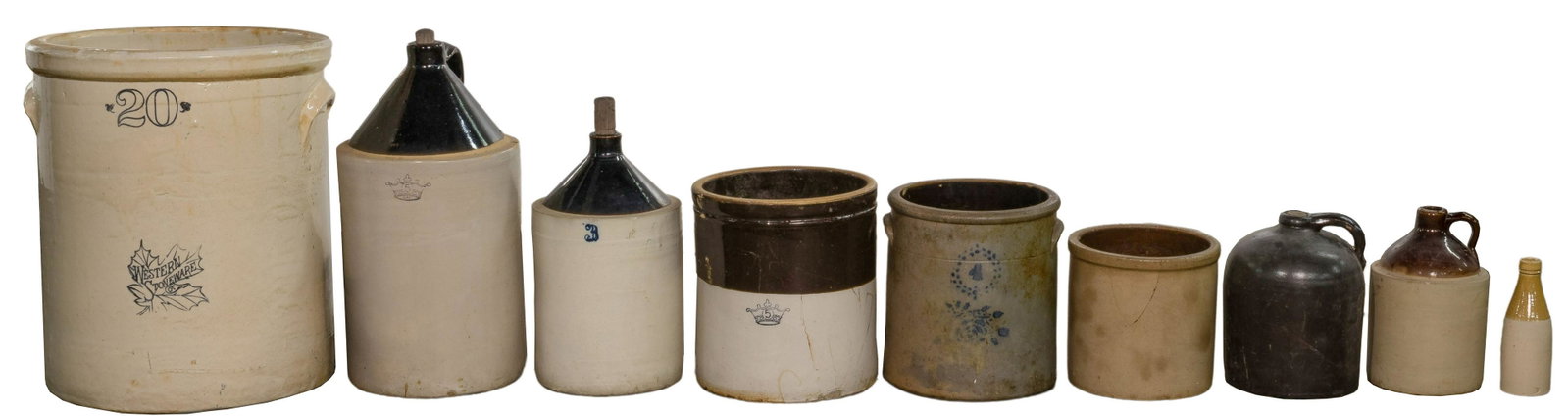 Crock Assortment: Crock Assortment (9) items of varying sized and forms including (4) jug style having tapered tops with integrated handles, (4) having cylindrical forms including wide rims as well as item having bottl