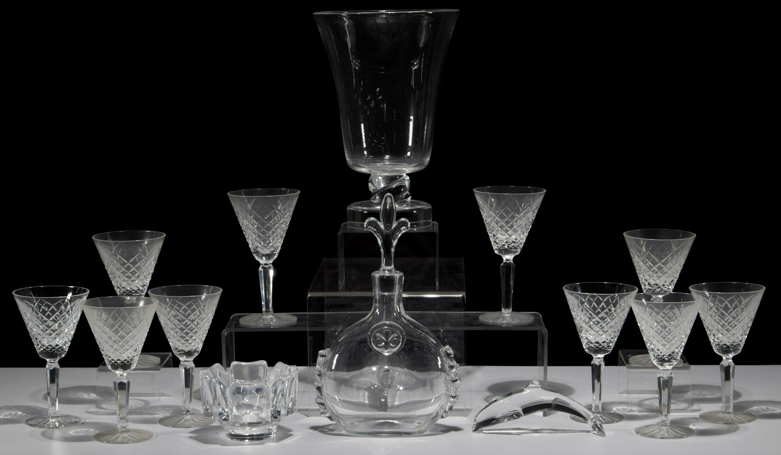 Crystal Assortment: Crystal Assortment (14) items including (10) Waterford 'Templemore' wine glasses, a 'Baccarat' dolphin figure, an 'Orrefors' bowl, a 'Daum' decanter and a 'Steuben' statement vase, all marked on side