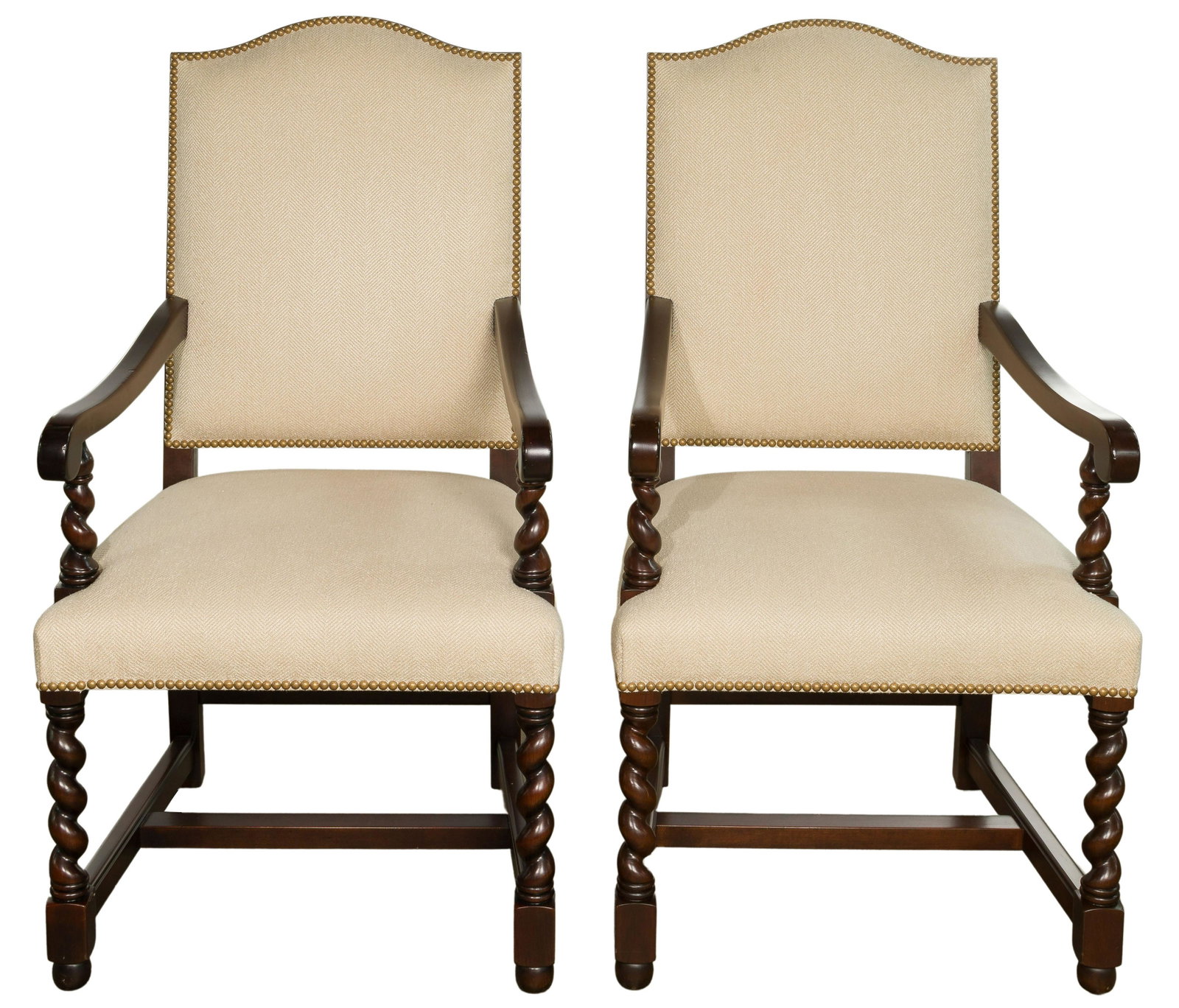 Stickley Upholstered Arm Chairs: Stickley Upholstered Arm Chairs (2) items having cream tone, herringbone patterned textured upholstery affixed to back and seat with round metal studs; wood components having dark stain with barley tw