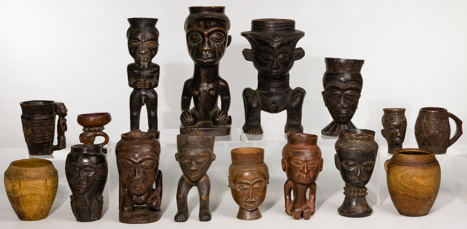 African Kuba Palm Wine Cup Assortment: African Kuba Palm Wine Cup Assortment (15) items including a larger janiform having addorsed male and female figures; a larger handled; a standing; a figural handled; (8) head cups; (3) non-figural ha