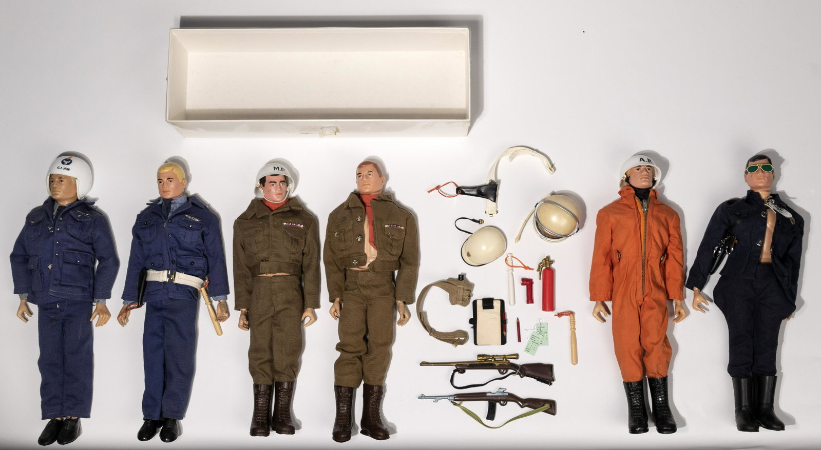 1964 Hasbro GI Joe Action Figures: 1964 Hasbro GI Joe Action Figures (6) figures including (4) police and (2) Air Force; all marked '1964' and 'Hasbro' on the bodies; most clothes and accessories marked 'Hasbro' Property from: a Oak Fo