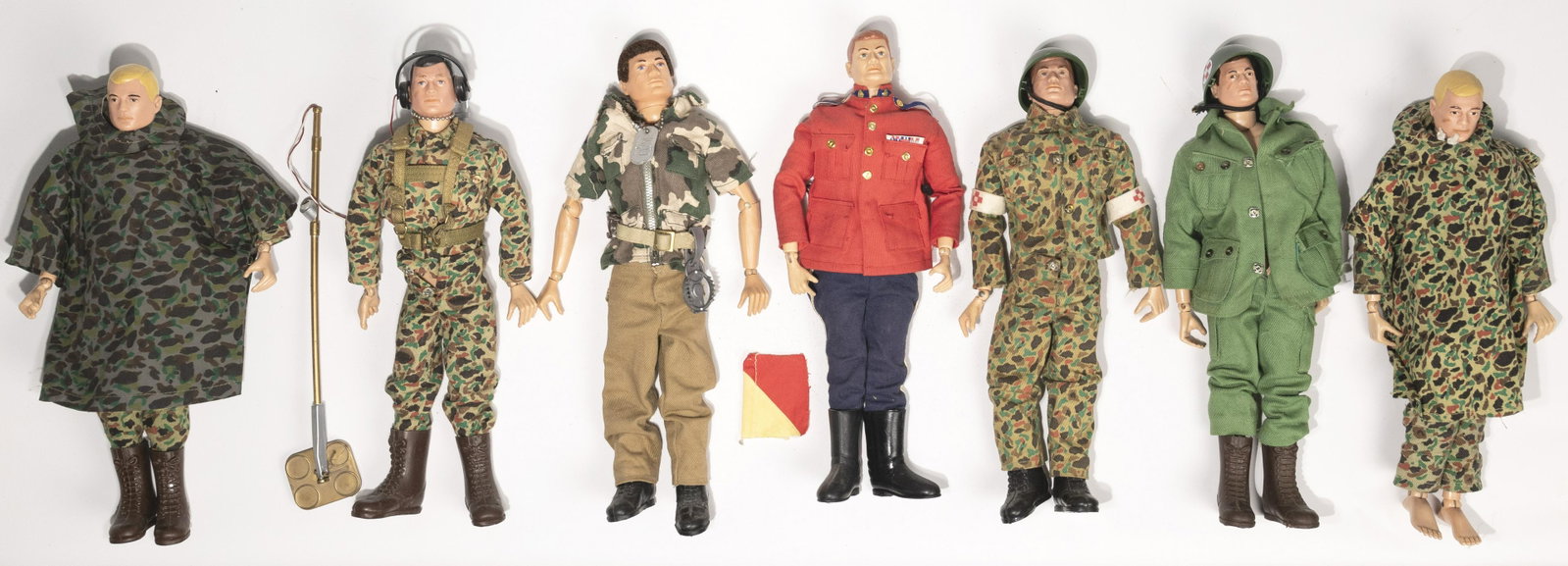 1964 Hasbro GI Joe Action Figures: 1964 Hasbro GI Joe Action Figures (7) figures in military uniforms; all dated 1964 on the bodies; most clothes labeled 'Hasbro' and 'Japan'; most accessories labeled 'Hasbro' Property from: a Oak Fore