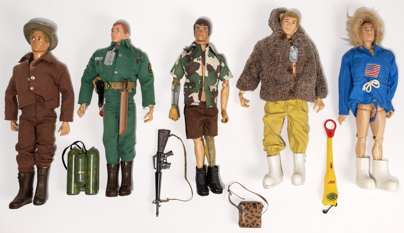 1964 Hasbro GI Joe Action Figures: 1964 Hasbro GI Joe Action Figures (5) figures including 'Atomic Man', 'Talking GI Joe' and (3) others in various uniforms / clothing; all marked 1964 on the bodies; most clothes marked 'Hasbro' and 'H