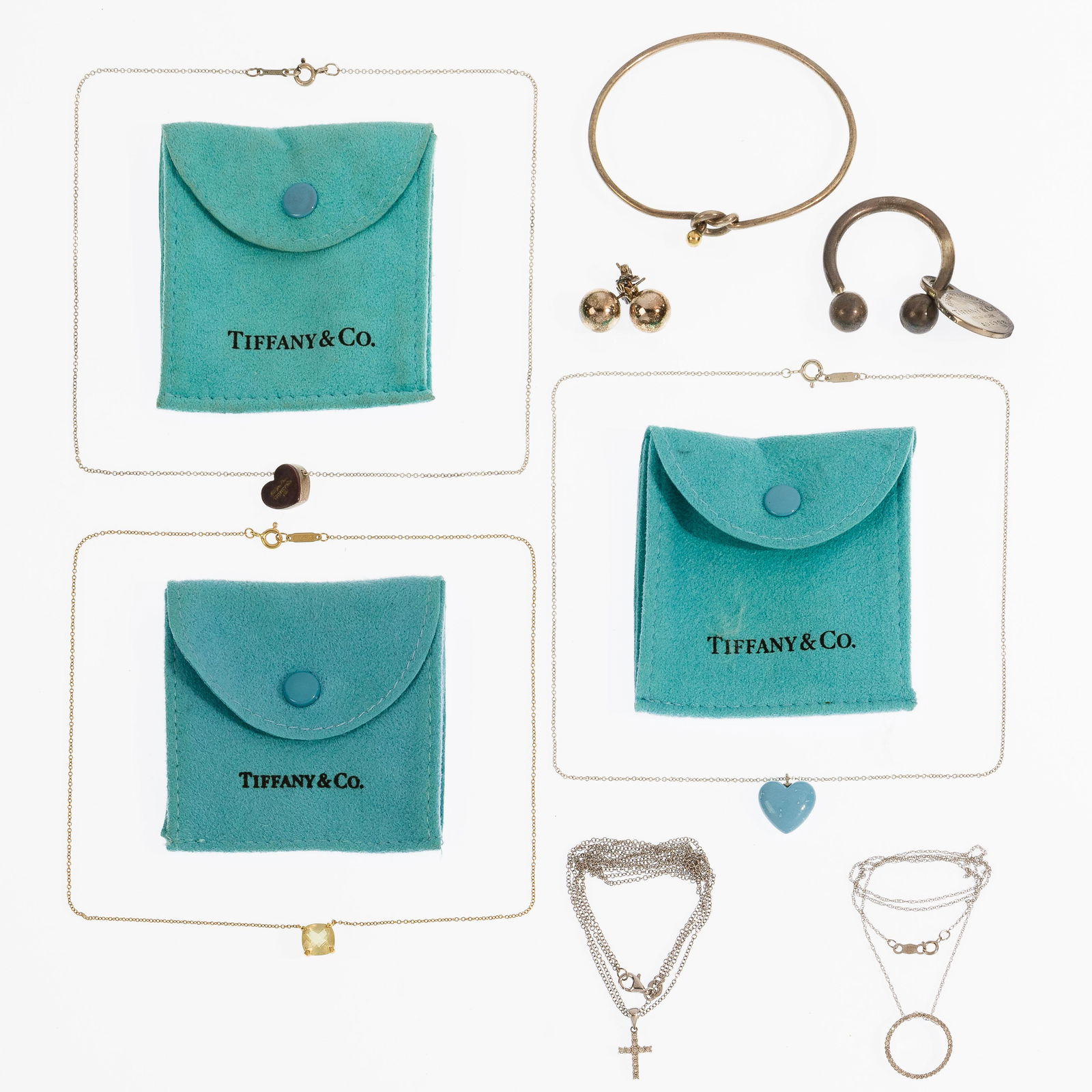 Tiffany & Co., Gold and Sterling Silver Jewelry Assortment: Tiffany & Co., Gold and Sterling Silver Jewelry Assortment Including in marked '18k' a choker necklace with a citrine pendant and a diamond encrusted cross pendant; in marked '14k' a diamond encrusted