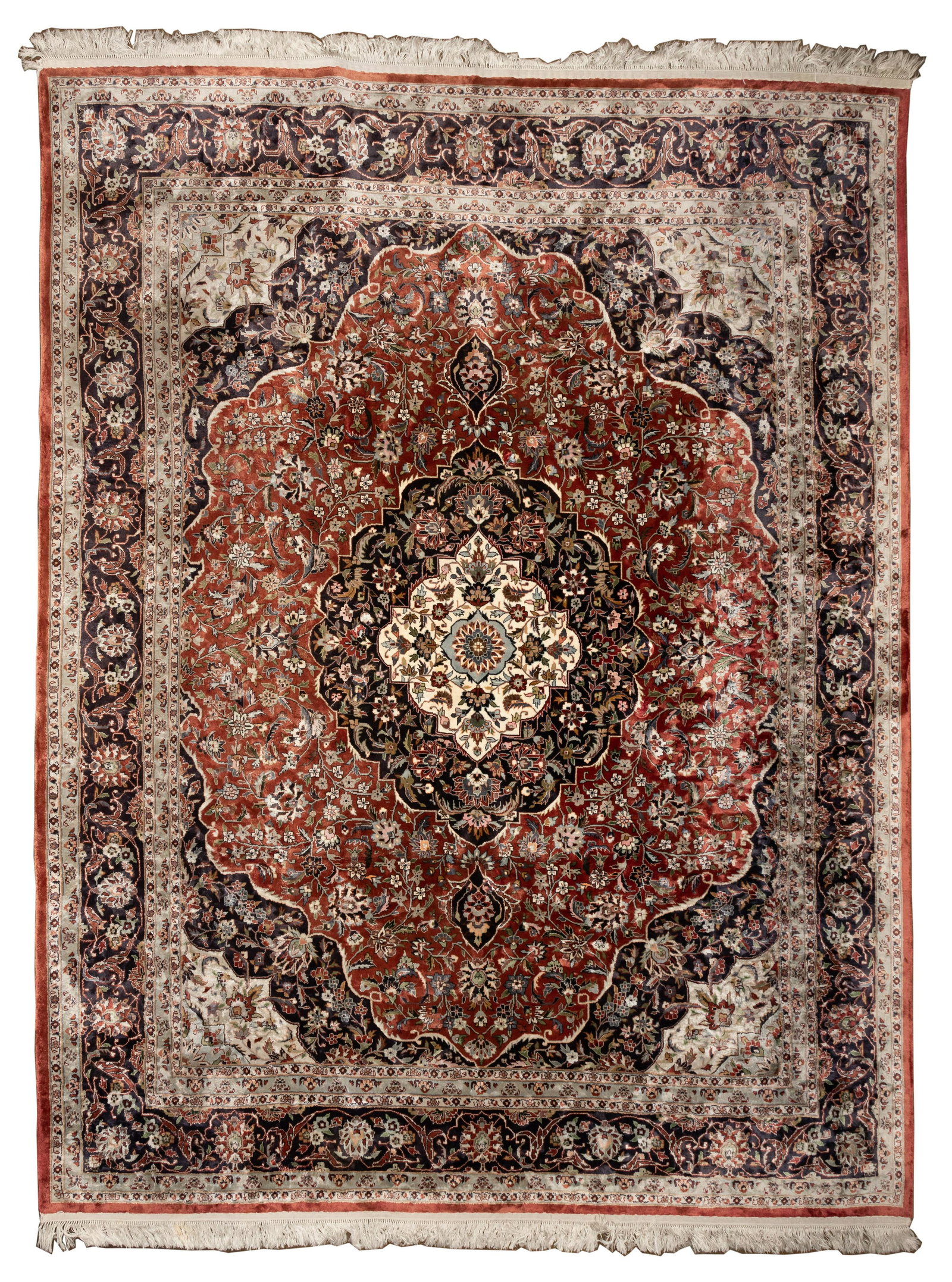 Persian Room Size Rug: Persian Room Size Rug Hand knotted in mercerized cotton having a center medallion with an abstract floral and geometric design in hues of grey, blue, black and tan on a rust field, fringe Length: 121 
