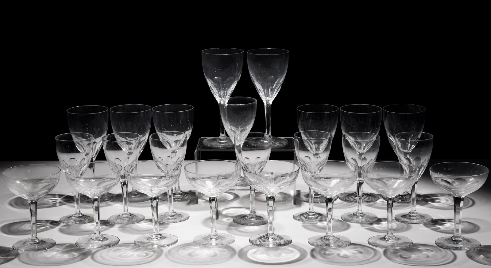Baccarat Crystal 'Zurich' Stemware Collection: Baccarat Crystal 'Zurich' Stemware Collection (24) pieces including (8) water goblets, (8) wine glasses and (8) champagne / tall sherbet; all marked on underside Property from: Private Collector, Winn