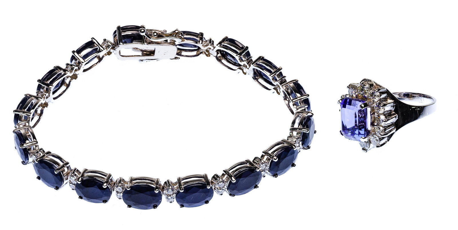 18k White Gold, Gemstone and Diamond Ring and Bracelet: 18k White Gold, Gemstone and Diamond Ring and Bracelet (2) items including bracelet having (16) oval cut sapphires with (32) round cut diamonds weighing approximately 1.37 carats total, SI-1/2 clarity