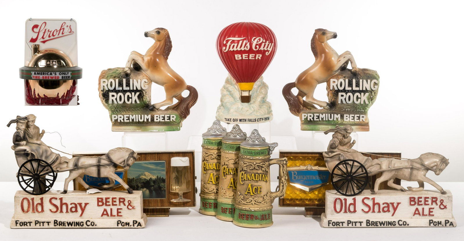 Beer Advertising Back Bar Display Assortment: Beer Advertising Back Bar Display Assortment (11) items including (2) Burgermeister light-ups; a Stroh's wall-hanging light-up; (2) Old Shay Beer & Ale horse and buggy figural having rubber figures on