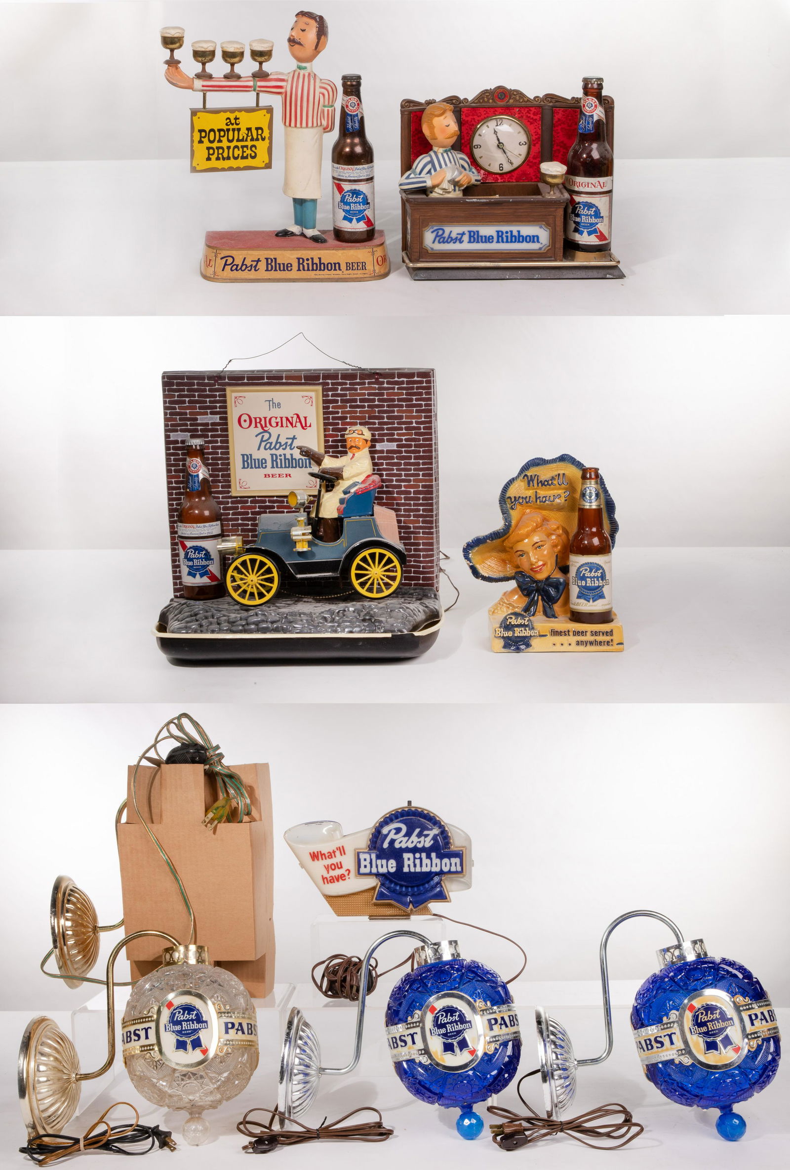 Pabst Beer Back Bar Display and Sconce Assortment: Pabst Beer Back Bar Display and Sconce Assortment (9) items including 'What'll You Have?' plaster woman wearing hat; 'Old Tyme Tavern' metal light-up clock; 'On Tap' metal waiter; plastic old time aut
