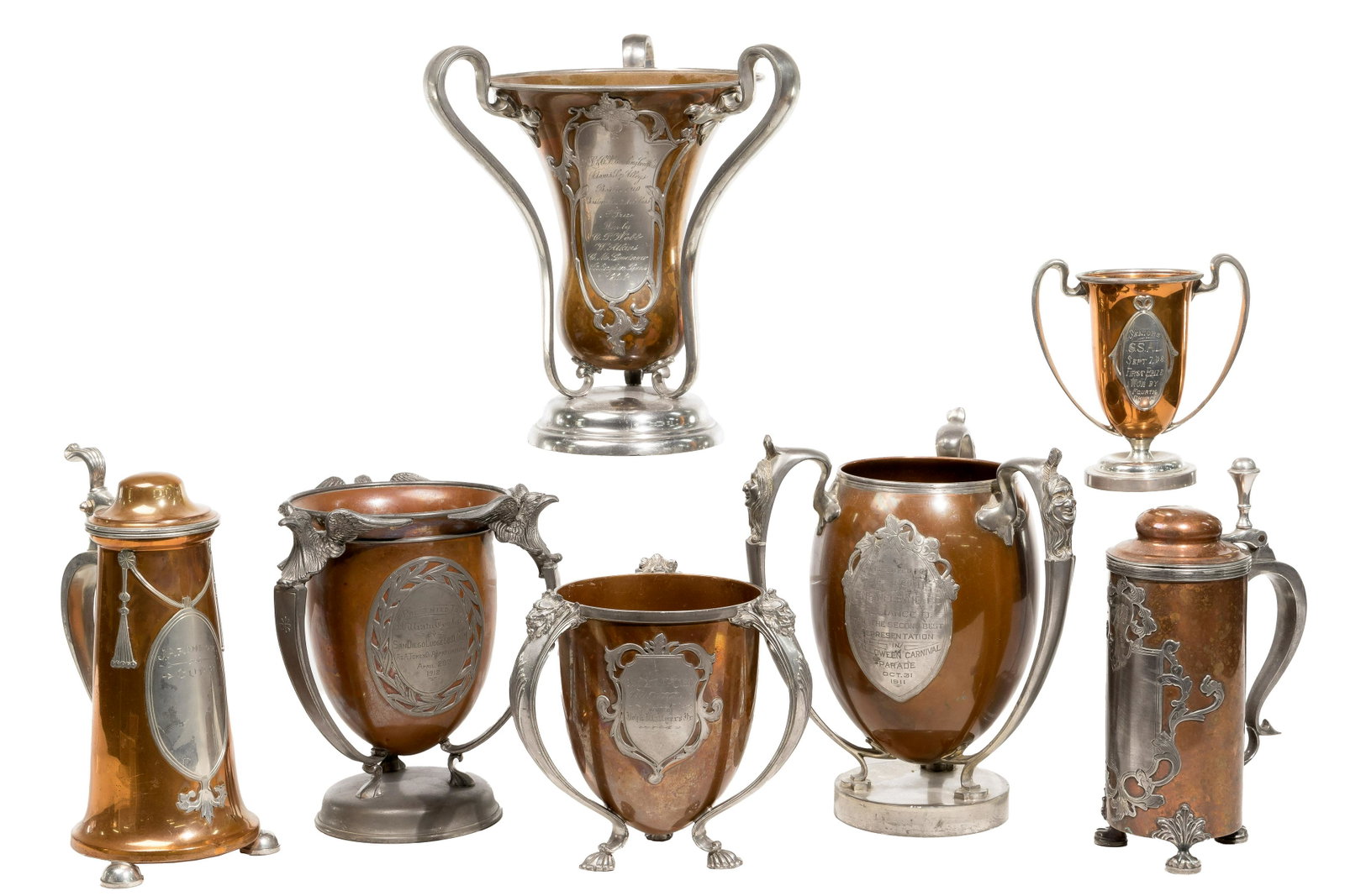 Pairpoint Presentation Trophy Assortment: Pairpoint Presentation Trophy Assortment (7) copper and pewter items of various shapes and sizes, all marked on undersides Property from: a Woodstock, Illinois estate Height: 11 inches, Width: 9 1/2 i