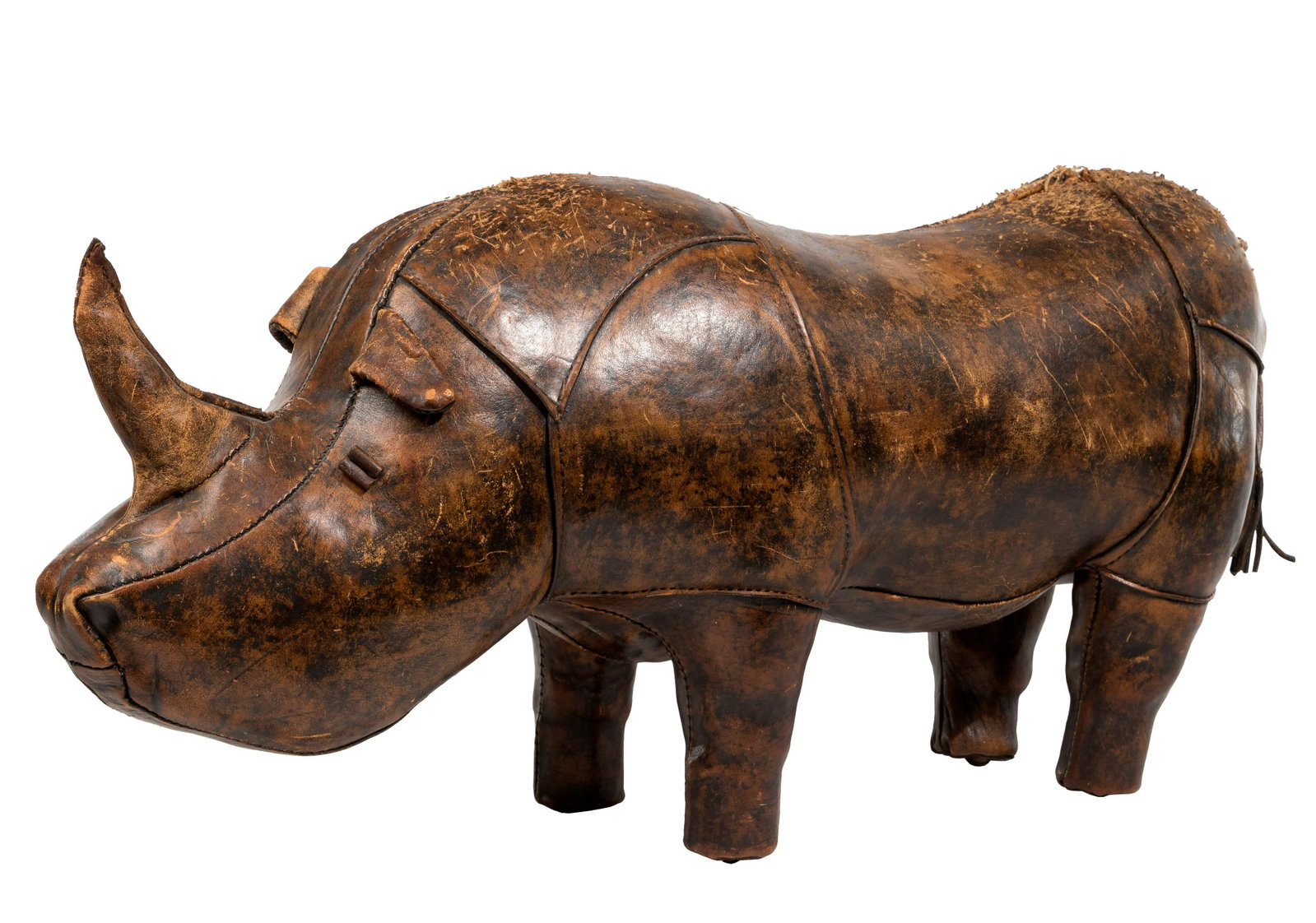 English Rhinoceros Form Brown Leather Foot Stool / Ottoman: English Rhinoceros Form Brown Leather Foot Stool / Ottoman Standing on four legs Property from: an Addison, IL collector Height: 15 1/2 inches, Length: 32 inches, Width: 10 inches Condition: Fair, hea