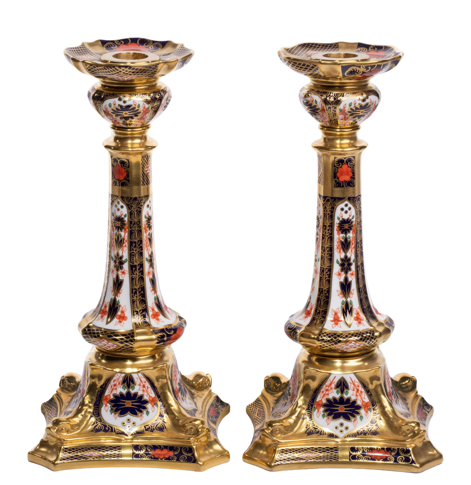 Royal Crown Derby 'Imari' Candleholders: Royal Crown Derby 'Imari' Candleholders Floral motif having lattice patterns in shades of reds and blues in white ground, 22k gold embellishments, stamped on underside #1128 LI Property from: an Estat