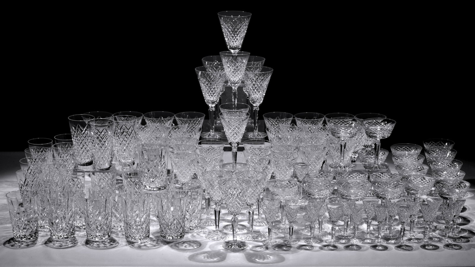 Waterford Crystal "Tyrone" Collection: Waterford Crystal 'Tyrone' Collection (101) items including (25) goblets, (25) wine glasses, (19) champagne coups, (16) cordials and (16) tumblers; together with (10) 'Lismore' double old fashioned gl
