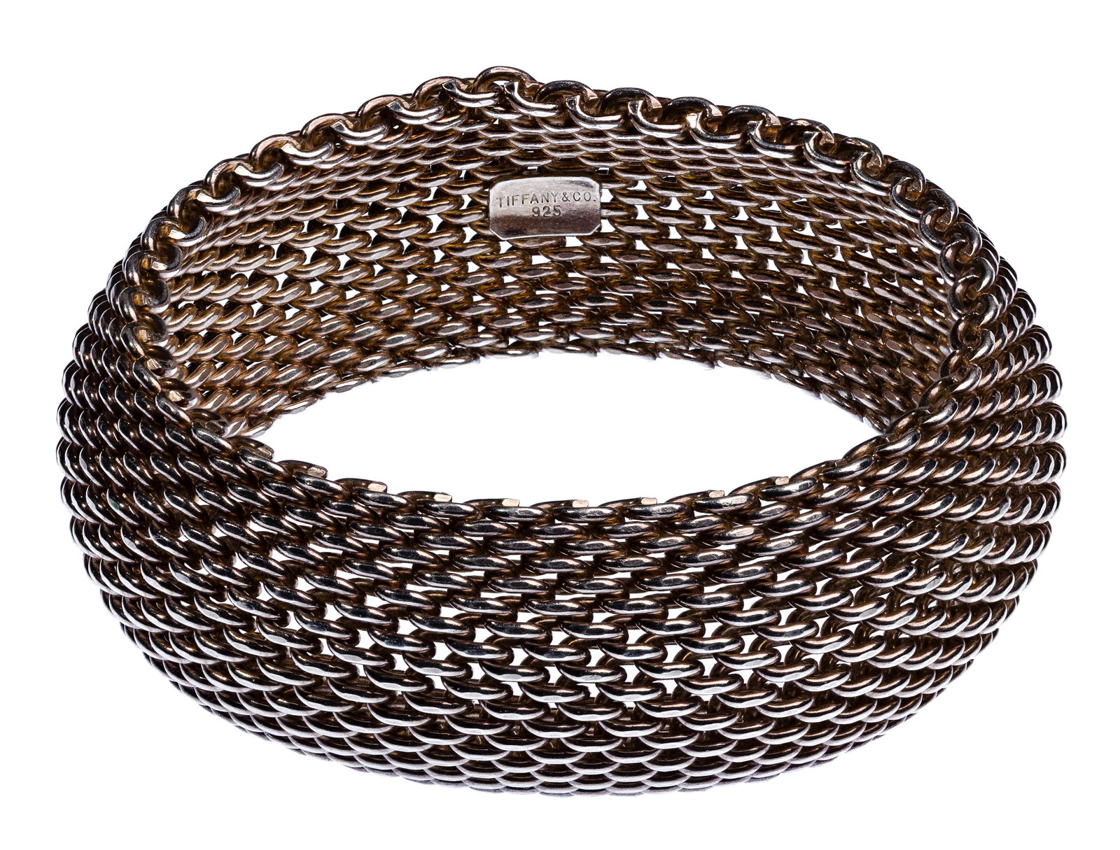 Tiffany & Co. Sterling Silver 'Somerset' Mesh Bracelet: Tiffany & Co. Sterling Silver 'Somerset' Mesh Bracelet Flexible mesh, 1-inch wide (marked 'Tiffany & Co 925' on inside) Property from: a Private Collector, Elmhurst, Illinois Length: 7 1/4 inches Weig
