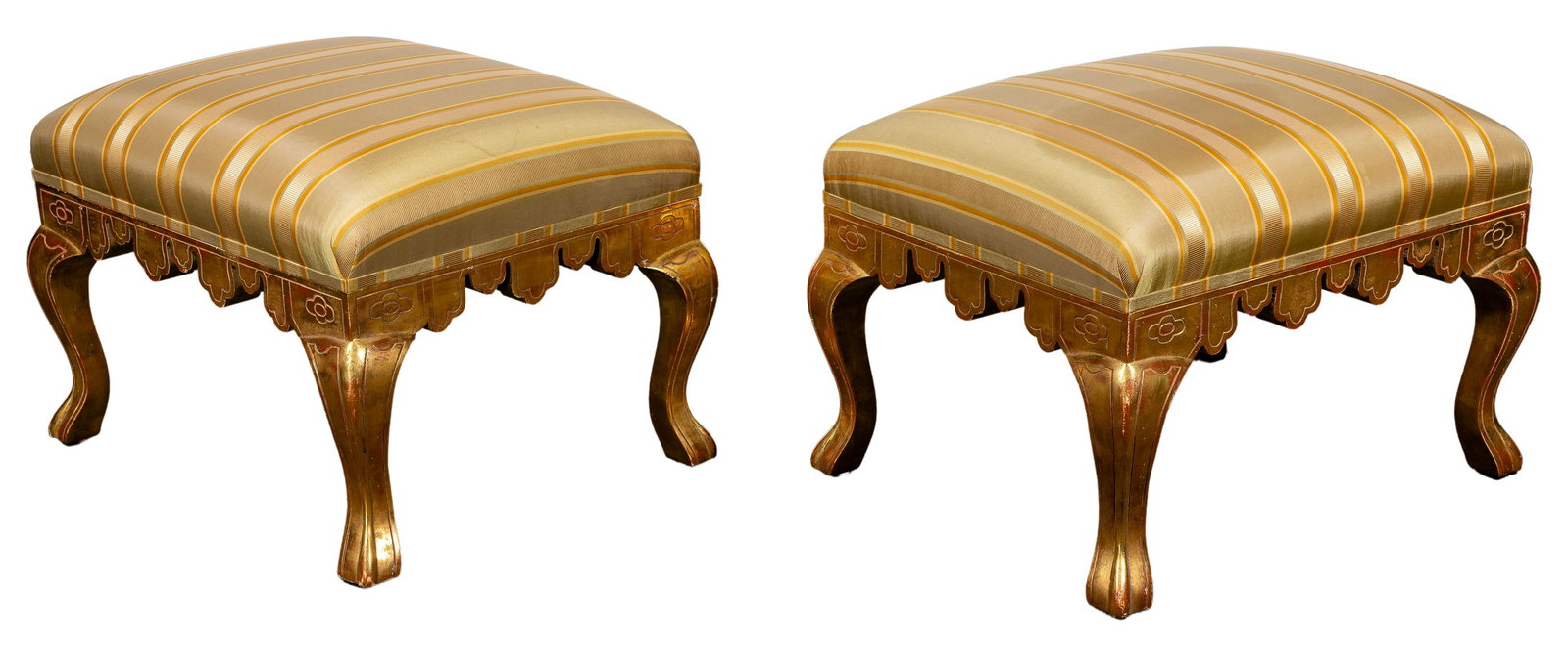 Michael Taylor Ottomans: Michael Taylor Ottomans Pair, having gilt scalloped skirts and rails, angular cabriole legs with green and gold striped upholstery, maintaining original metal tags on undersides Property from: an Esta