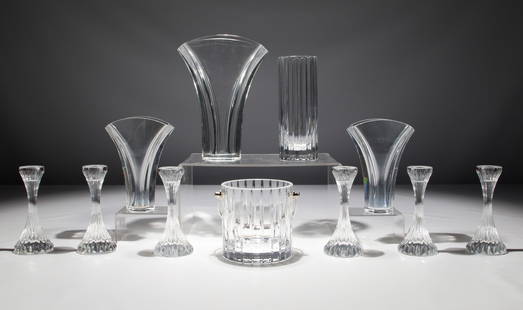 Baccarat Crystal Assortment: Baccarat Crystal Assortment (11) items including (4) vases, an ice bucket and (6) candlesticks, all acid marked on underside, some having original boxes Property from: an Estate, DeKalb, Illinois Heig