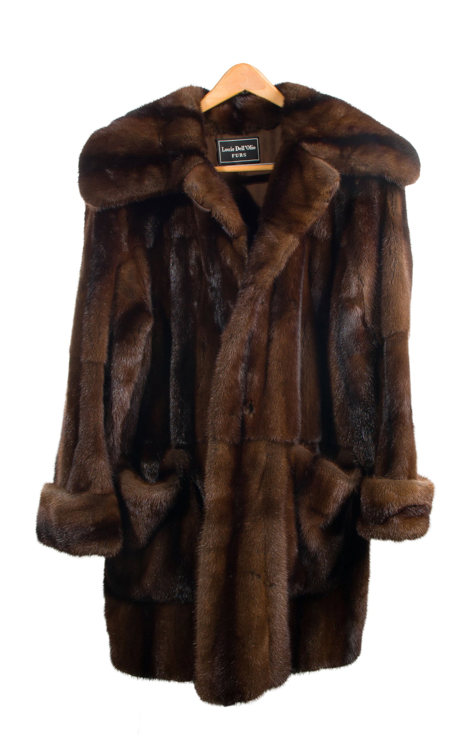 Mink Fur Coat: Mink Fur Coat Mahogany colored having shawl collar, patch pockets, cuffed sleeves, jewel button closure, Neiman Marcus and Louis Del Olio tags on inside Property from: an Estate, Wilmette, Illinois Si
