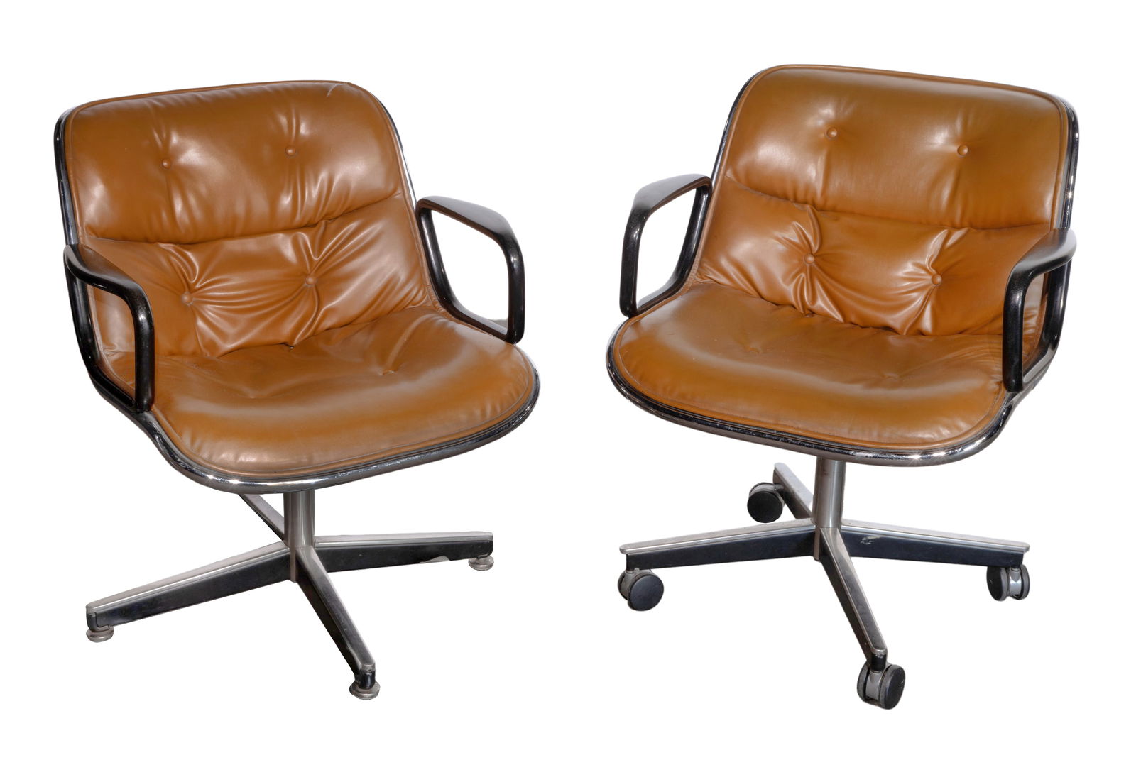 Charles Pollock for Knoll Executive Chairs: Charles Pollock for Knoll Executive Chairs Armchairs with caramel colored vinyl upholstery, one raised on casters, maintaining original labels to undersides Property from: an Estate, Chicago (Lakeview