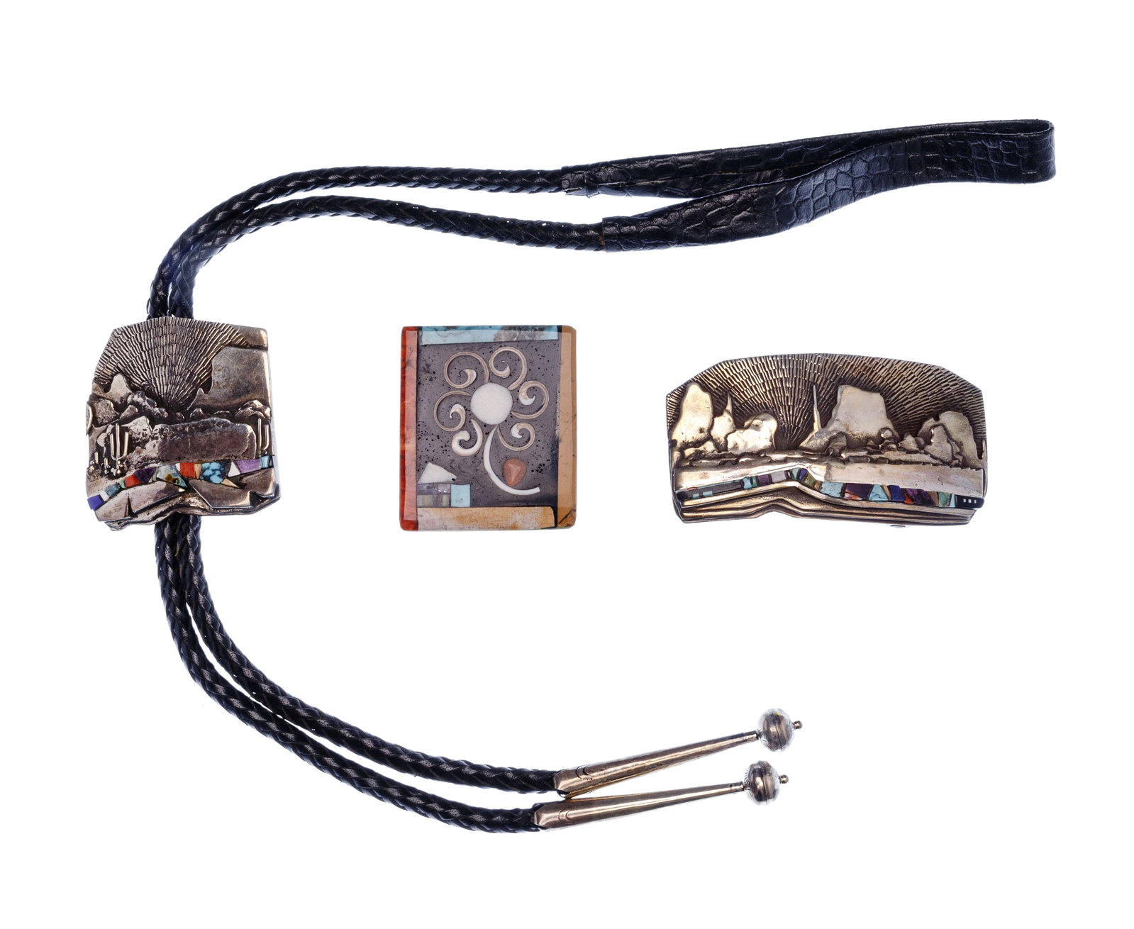 Southwestern Jewelry Assortment: Southwestern Jewelry Assortment (3) items including an inlaid floral design pin signed 'Tafoya' on backside as well as a bolo and belt buckle signed 'Romer' on backside Property from: a Private Collec