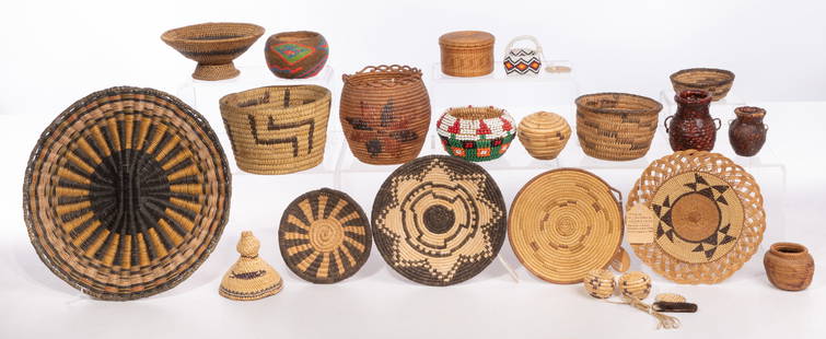 Native American Basket Collection: Native American Basket Collection (20) items including a fully beaded pine needle, a beaded Paiute coiled, a beaded Choctaw having handle, (2) coiled Apache trays, a Hupa twined tray having plaited ri