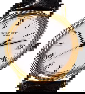 Patek Phillippe 18k Yellow Gold Case and Buckle Calatrava Wristwatch: Patek Phillippe 18k Yellow Gold Case and Buckle Calatrava Wristwatch #3442267 3870 / 200 inside case having a white dial, black Roman numerals, a sweep second hand and date at 3-o'clock, 29-jewel manu