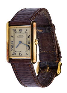 Cartier Must de Cartier Tank Vermeil Sterling Silver Wristwatch: Cartier Must de Cartier Tank Vermeil Sterling Silver Wristwatch #86962 rectangular dial with black enameled Roman hours, polished vermeil over sterling silver case, sapphire cabochon on crown, quartz