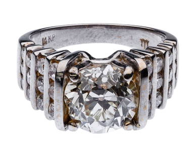14k White Gold and 2.75 Carat Diamond Ring GIA: 14k White Gold and 2.75 Carat Diamond Ring GIA Having an old European cut center diamond weighing approximately 2.75 carats, L color, SI-2 clarity, GIA report #7235135801 and flanked by twenty-four br