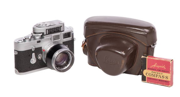 Leica M3 35mm Camera: Leica M3 35mm Camera Having a Summicron 1:2/50 Leitz Wetzlar lens serial #1811235 and leather case; together with an Airguide pocket compass in original box Property from: an Estate, Barrington, Illin
