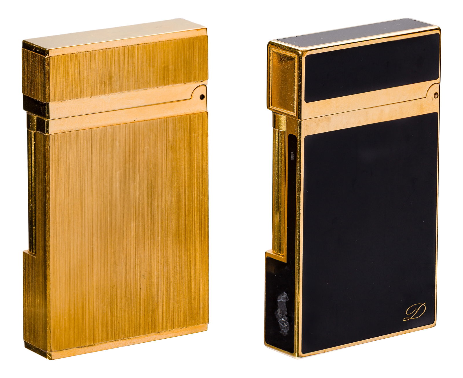 S T Dupont Ligne Lighters: S T Dupont Ligne Lighters (2) items, both having a rectangular shape, a hinged lid and a single thumb-push ignition with one having a brushed gold plate, one having black enamel construction, stamped 