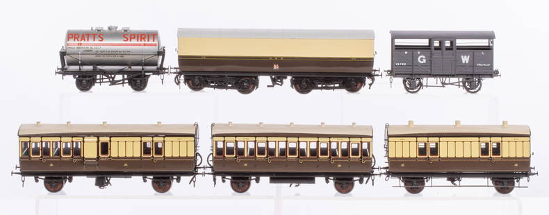 Lawrence Scale Models Model Train O Scale Car Assortment: Lawrence Scale Models Model Train O Scale Car Assortment (6) kit-made, hand painted items from various railways including (2) carriages, a luggage car, a bullion van, an oil tanker and a cattle car, a