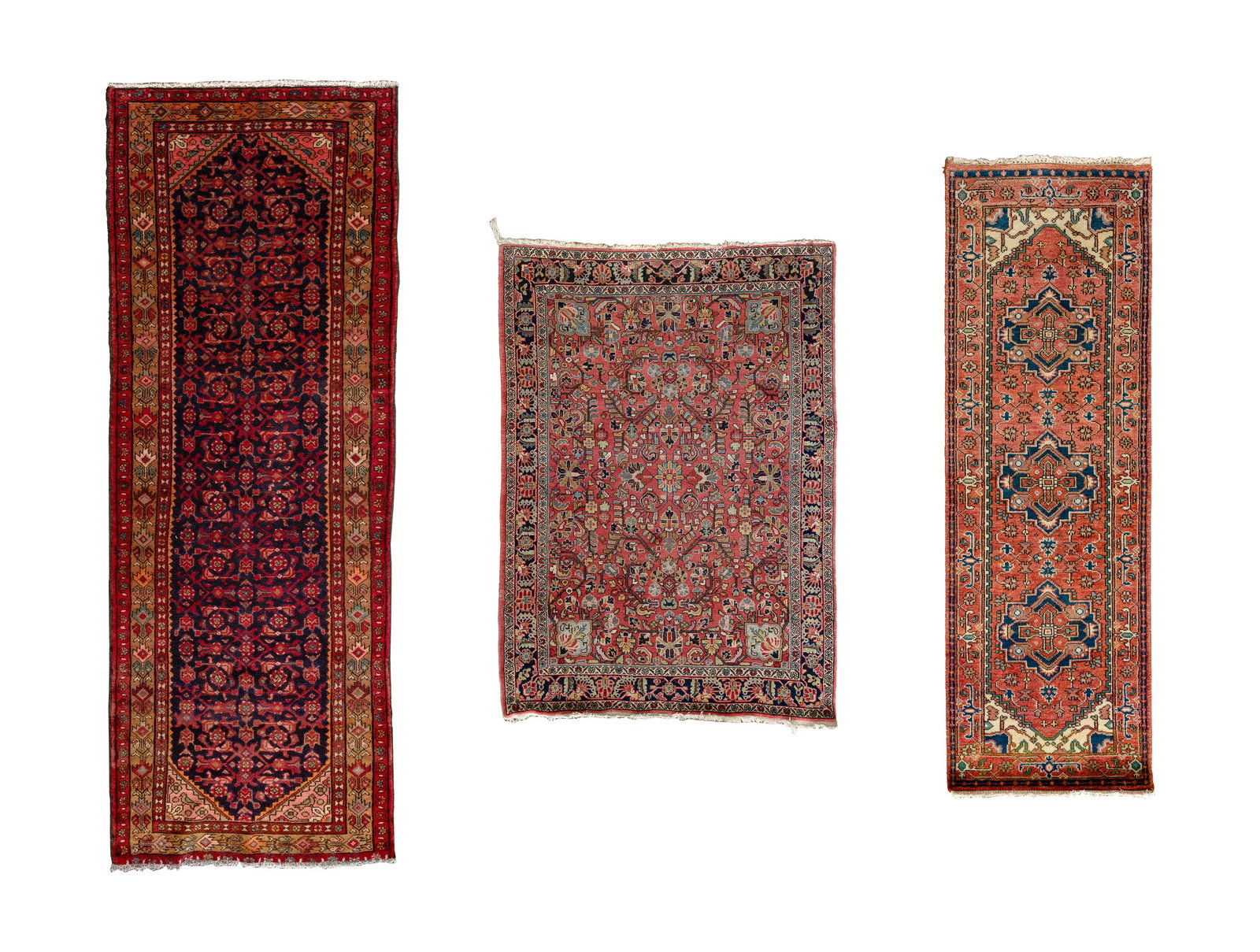 Persian Wool Rug Assortment: Persian Wool Rug Assortment (3) items including a hand knotted abstract floral runner in hues of brown, pink and green on a blue field, fringe, a Serapi runner in an abstract geometric motif having hu