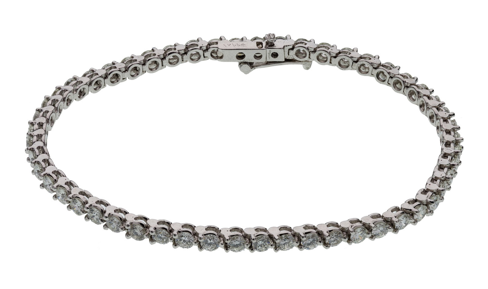Platinum and Diamond Bracelet: Platinum and Diamond Bracelet Having round cut diamonds set in a tennis style bracelet (unmarked) Property from: a Private Collector, Evanston, Illinois Length: 6 3/4 inches Weight: .950 platinum: 7.4