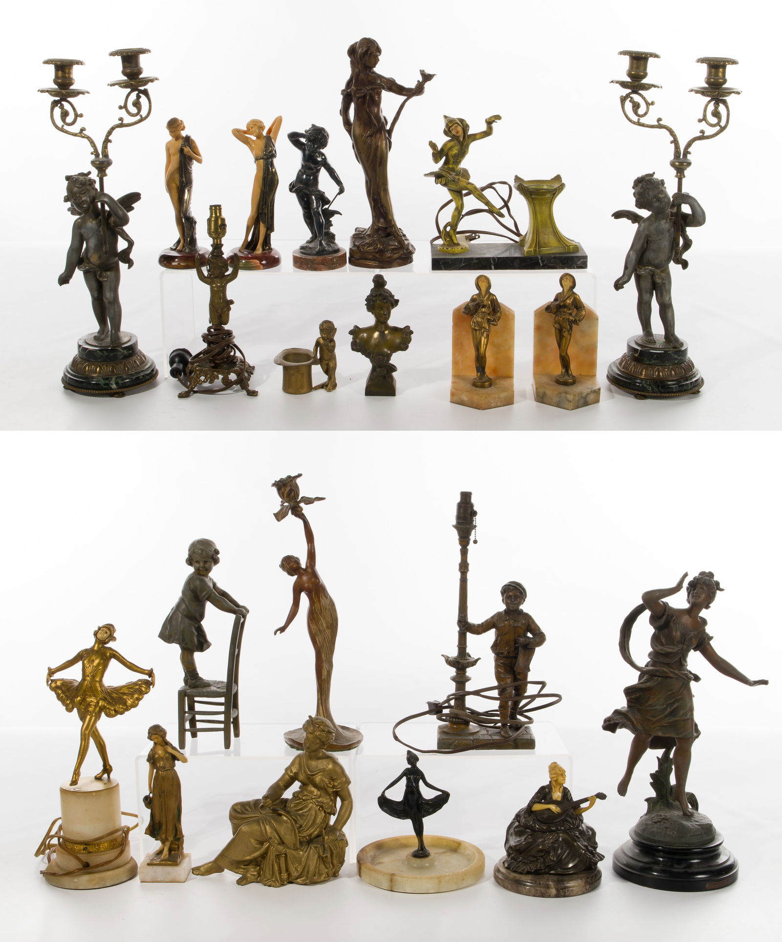 Decorative Metal Sculpture Assortment: Decorative Metal Sculpture Assortment (18) items including the 'l'Hesitation' figure after A. Moreau, a pair of bookends, a pair of cherub candlesticks, table lamps, figurines all of various forms, sh