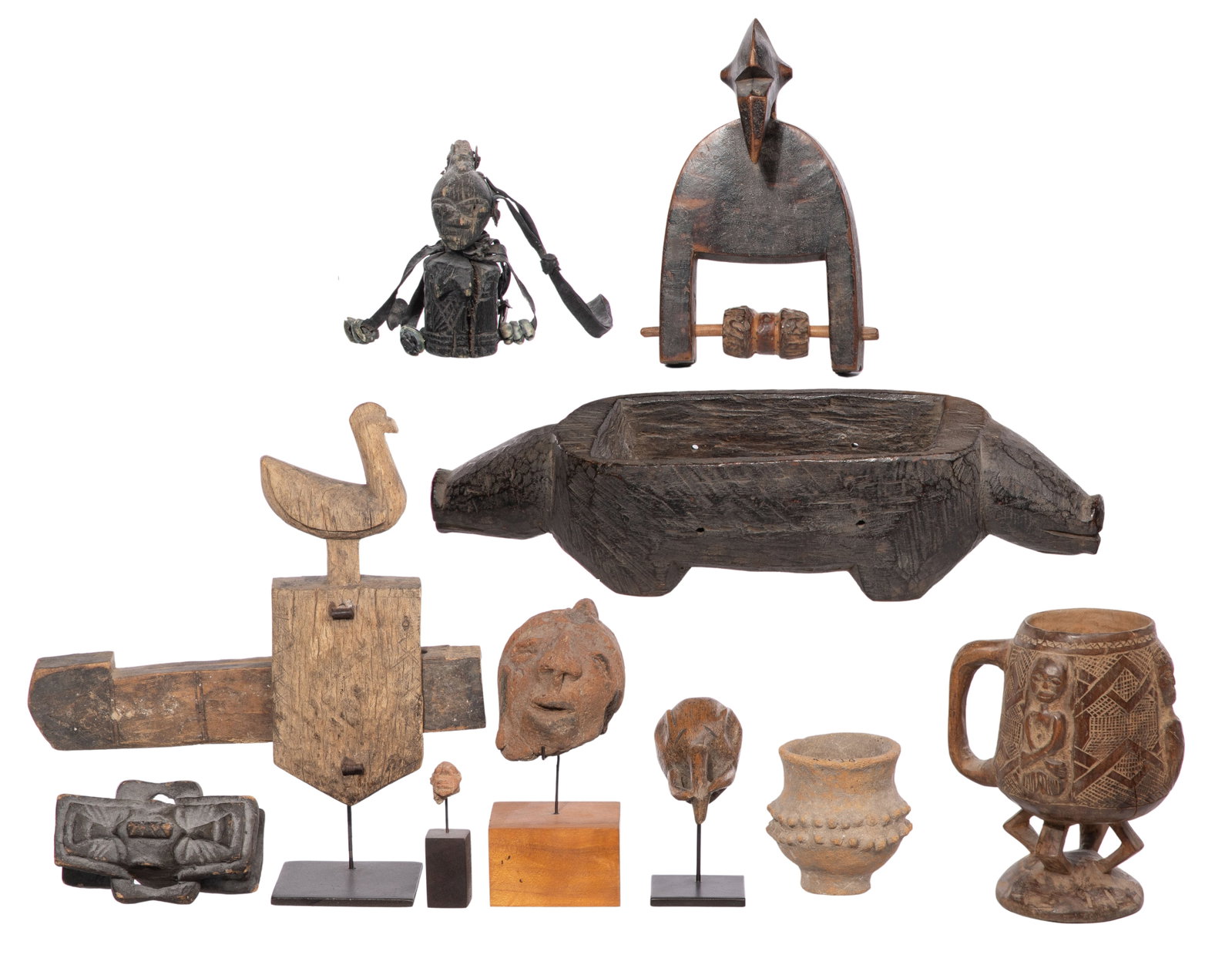 African Object Assortment: African Object Assortment (10) items including (3) Djenne terracotta items comprising a pot as well as a large and a small head on stands, wood carvings including a Baule granary door lock on metal st