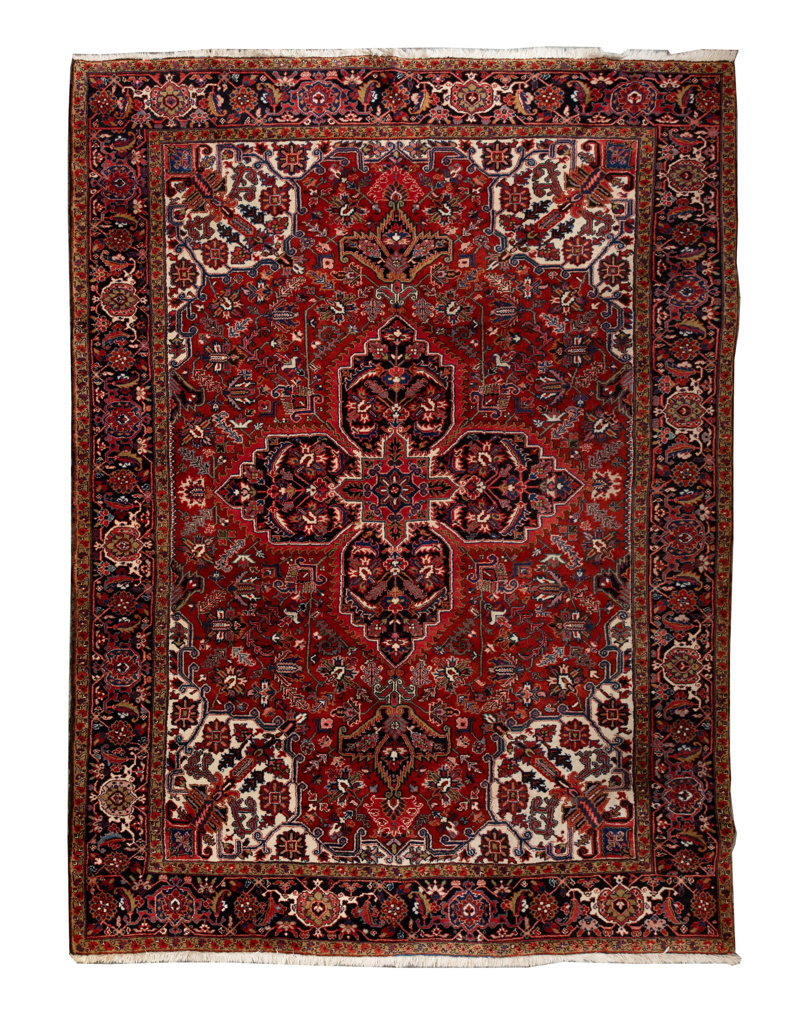 Indo-Persian Wool Rug: Indo-Persian Wool Rug Hand knotted having an abstract floral and medallion design in hues of green, blue, rust, tan and cream on a wine field, fringe Property from: a Private Collector, Chicago (Roger