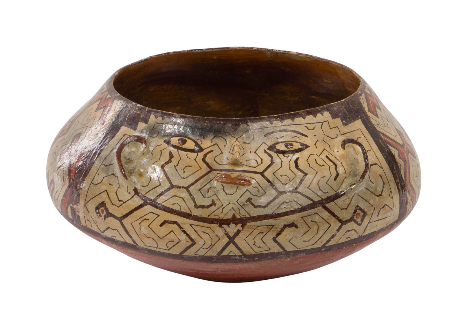 Shipibo Pottery Vase: Shipibo Pottery Vase An earthenware pottery vase having hand painted geometric designs using natural pigments Property from: an Estate, Evanston, Illinois Height: 7 inches, Diameter: 9 inches Conditio