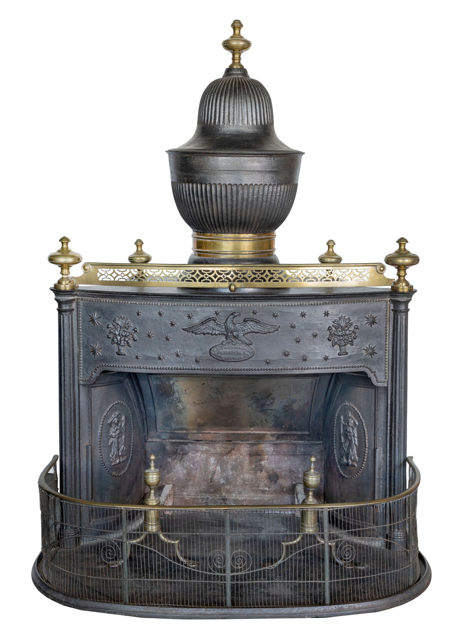 T. W. Tallmadge Cast Iron Franklin Stove: T. W. Tallmadge Cast Iron Franklin Stove (7) total items including a brass-mounted black cast-iron stove having an eagle and Grecian accents; together with a pair of andirons, a log tool, a brass trim