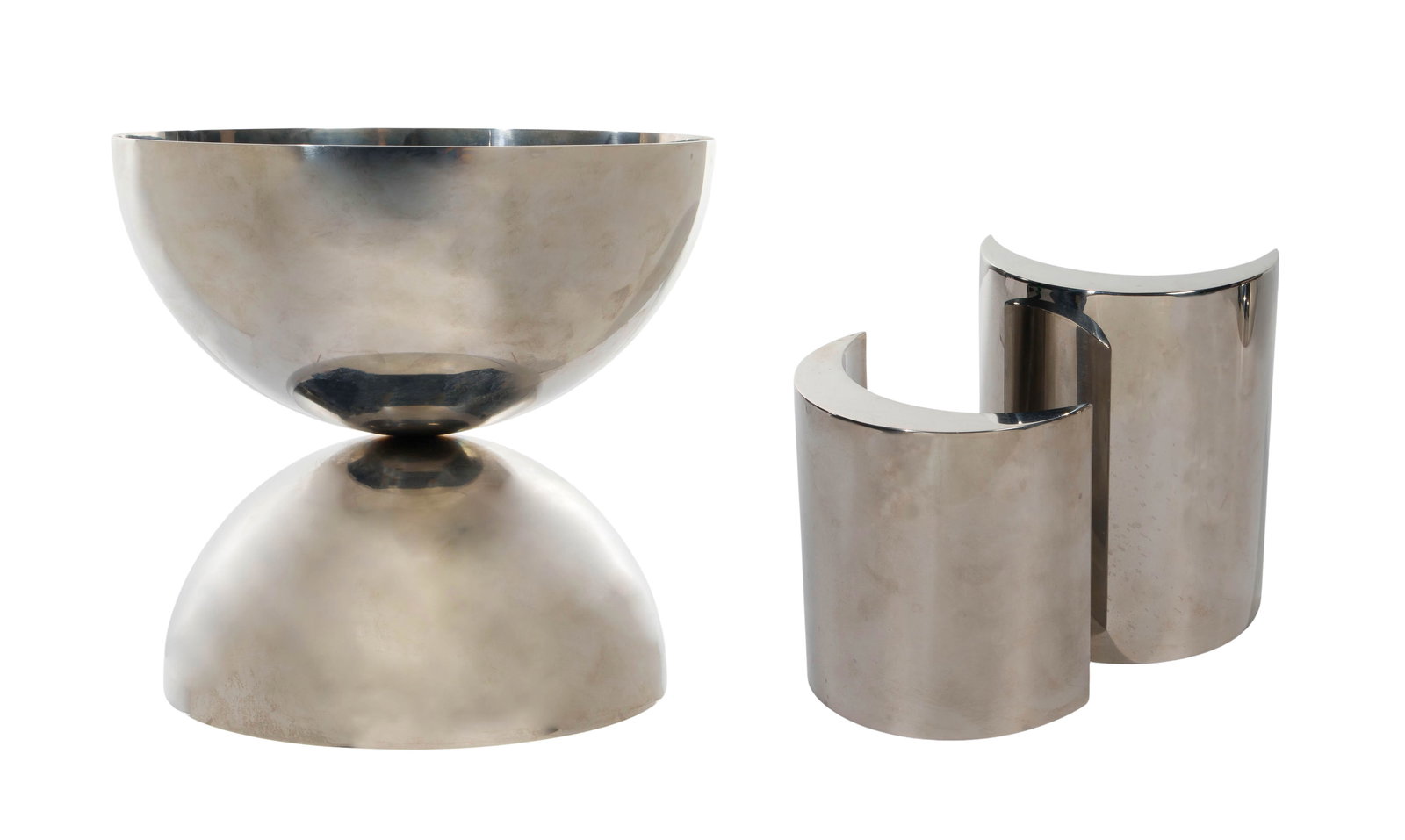 Mid-Century Stainless Steel Decorative Objects: Mid-Century Stainless Steel Decorative Objects (3) items including (2) similar crescent shaped sculptures with the larger signed 'Edmundo Fernandez 1977' as well as a larger half sphere vessel fixed t