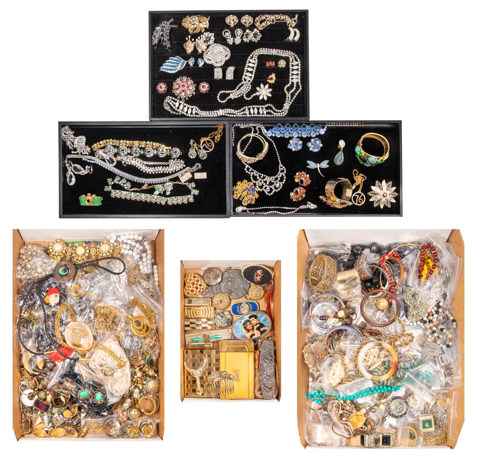Rhinestone and Costume Jewelry Assortment: Rhinestone and Costume Jewelry Assortment Approximately (45) pieces of rhinestone jewelry including necklaces, bracelets, pendants, earrings, brooches and pins as well as approximately (20) pounds of 