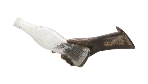 Whistle Beverage Advertising Cast Iron Hand and Bottle