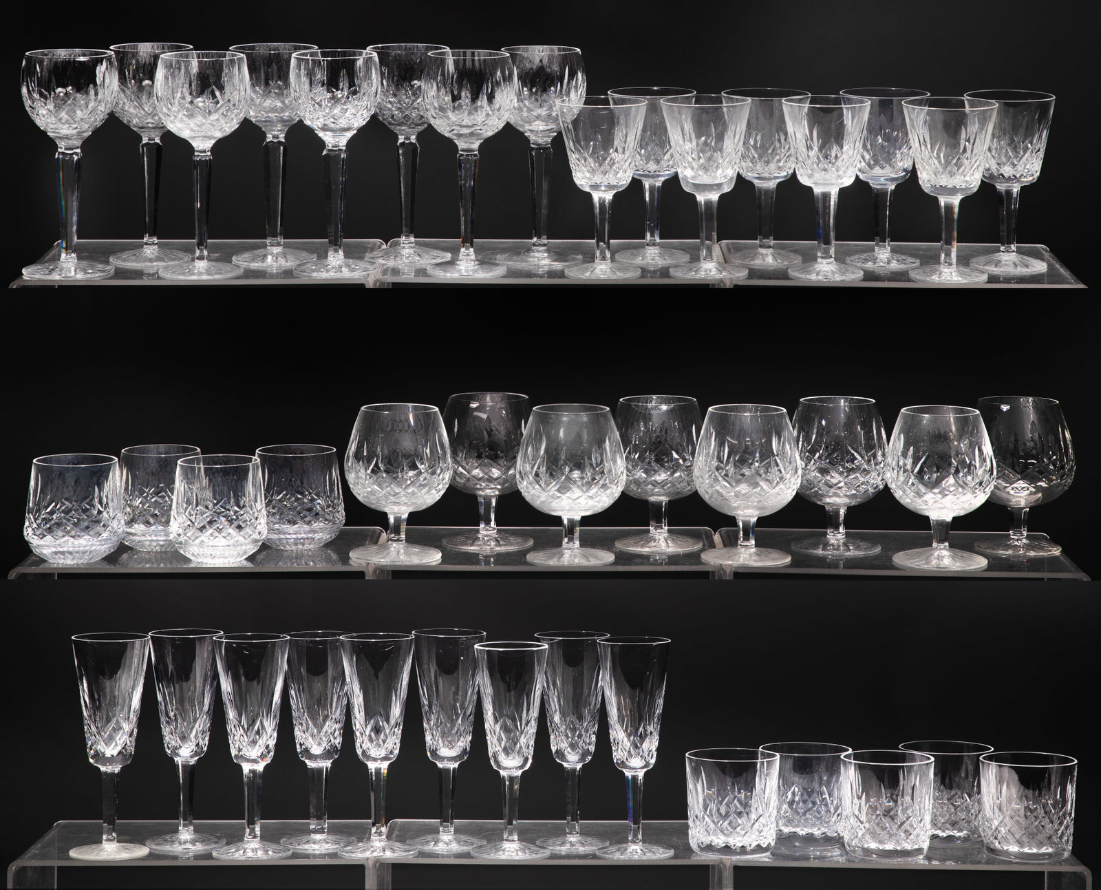 Waterford Crystal Stemware Lismore Collection: Waterford Crystal Stemware Lismore Collection (42) items including (8) wine, (8) hock wine, (9) flutes, (5) on the rocks tumblers, (8) brandy snifters and (4) round bottom old fashioned tumblers, all 