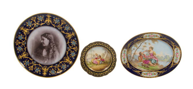 Sevres Plate Assortment: Sevres Plate Assortment (13) total items including a set of (11) scalloped cobalt blue and gilt tea plates having vignettes painted in the center as well as a cobalt and gilt oval platter, all marked