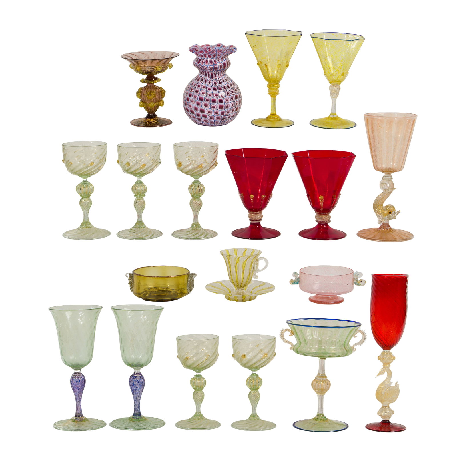 Venetian Glass Assortment: Venetian Glass Assortment (19) items including a c.1900 latticino footed cup and saucer having a yellow ribbon design, a c.1890 raspberry and gold fleck tazza, (3) pairs of gold flecked wine glasses, 