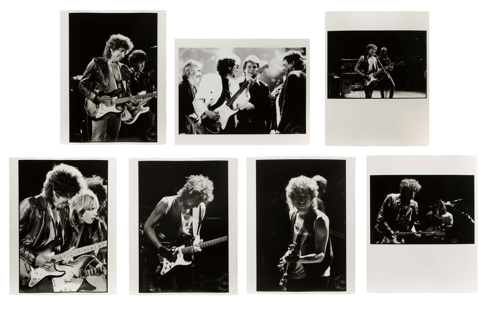 Robert Matheu (American, 1955-2018) Bob Dylan Photograph Assortment: Robert Matheu (American, 1955-2018) Bob Dylan Photograph Assortment (7) items, all black and white, including (6) performance images and a group shot, five having photographer blind stamp Property fro