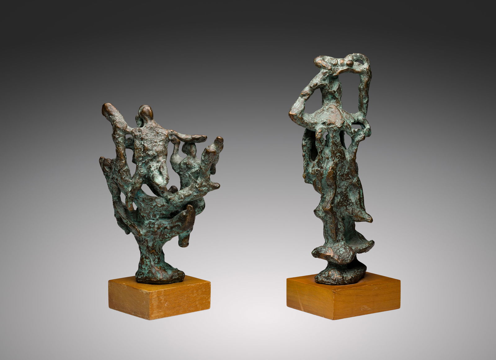 Attributed to Abbott Pattison (American, 1916-1999) Bronze Sculptures: Attributed to Abbott Pattison (American, 1916-1999) Bronze Sculptures (2) undated items, unsigned, modern brutalist bronzes having abstract figures intertwined and a green patina, set on wood bases Pr