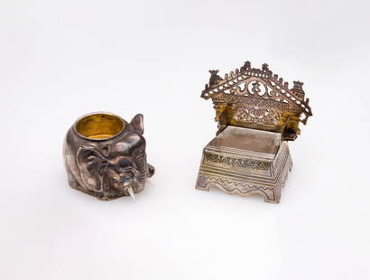 Russian Silver Salt Cellars: Russian Silver Salt Cellars (2) items including a Victor Savinkov throne style (marked 'MG' / 'B.C 1888' / '84') and elephant form (marked 'I.P.' / '88') Property from: The Estate of Sondra Bernfield,