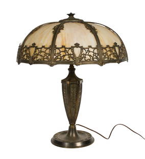 Art Nouveau Style Slag Glass Shade Table Lamp: Art Nouveau Style Slag Glass Shade Table Lamp Having an unmarked copper alloy 2-socket base and unmarked 8-panel shade Property from: a Private Collector, Oswego, Illinois Height: 24 1/4 inches, Diame