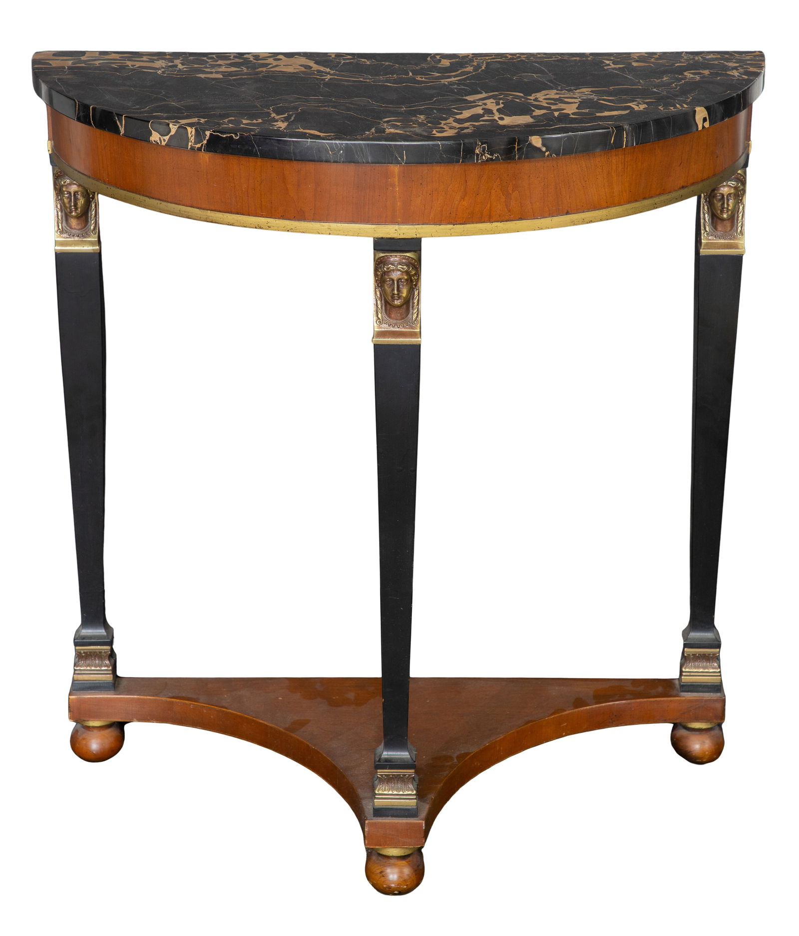 Demilune Marble Top Table: Demilune Marble Top Table Having fruit-wood veneers, ebonized tapered legs and ball feet, cast brass face mounts and a removable black veined marble top, retaining original Fine Arts Furniture label u