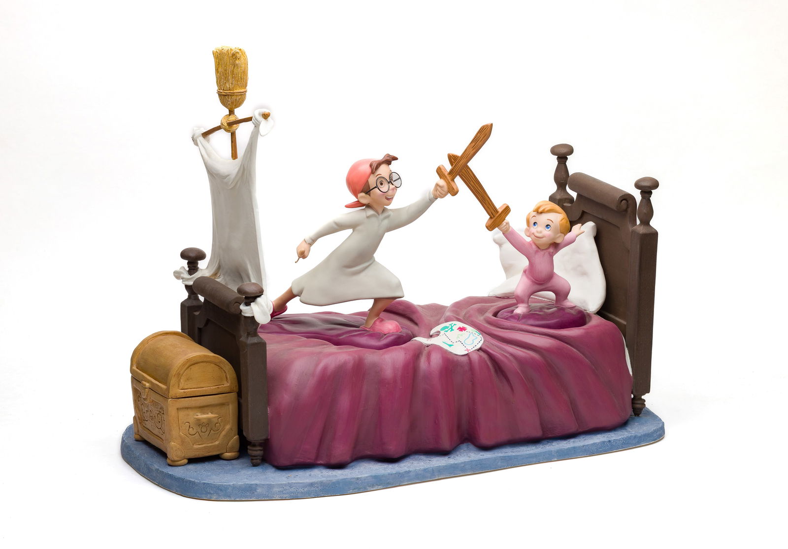 Disney Classics Collection 'Peter Pan' Figurine: Disney Classics Collection 'Peter Pan' Figurine A 3-piece porcelain set including 'Back, You Villain' Michael and 'You'll Never Leave This Ship Alive' John, depicting a sword fight on a bed base, mark